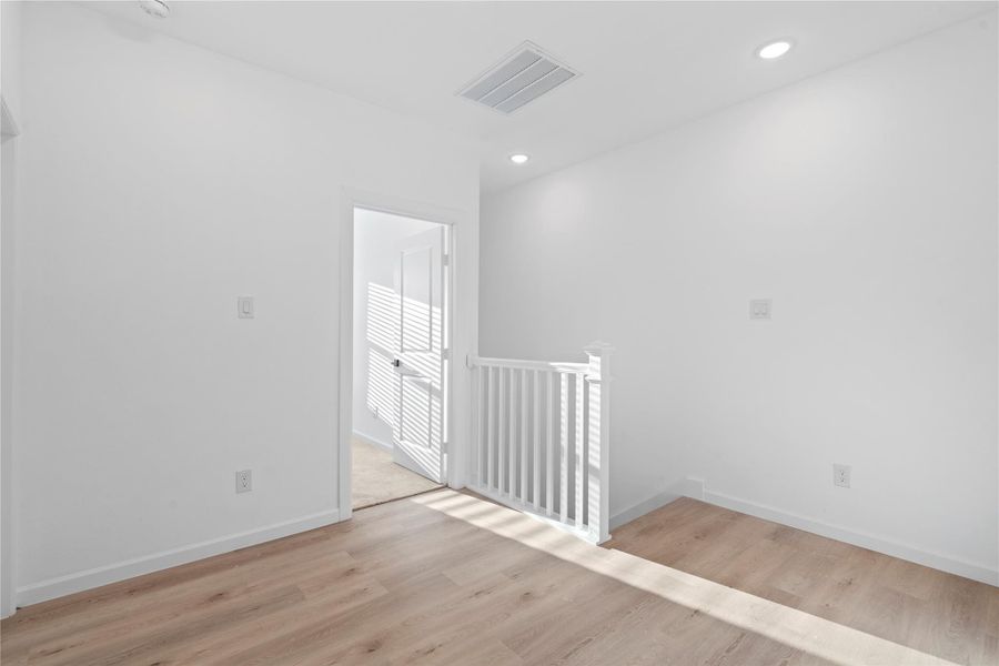 Upstairs landing creates a functional flex space — great for a desk, reading chair, or extra storage. Upstairs landing creates a functional flex space — great for a desk, reading chair, or extra storage.