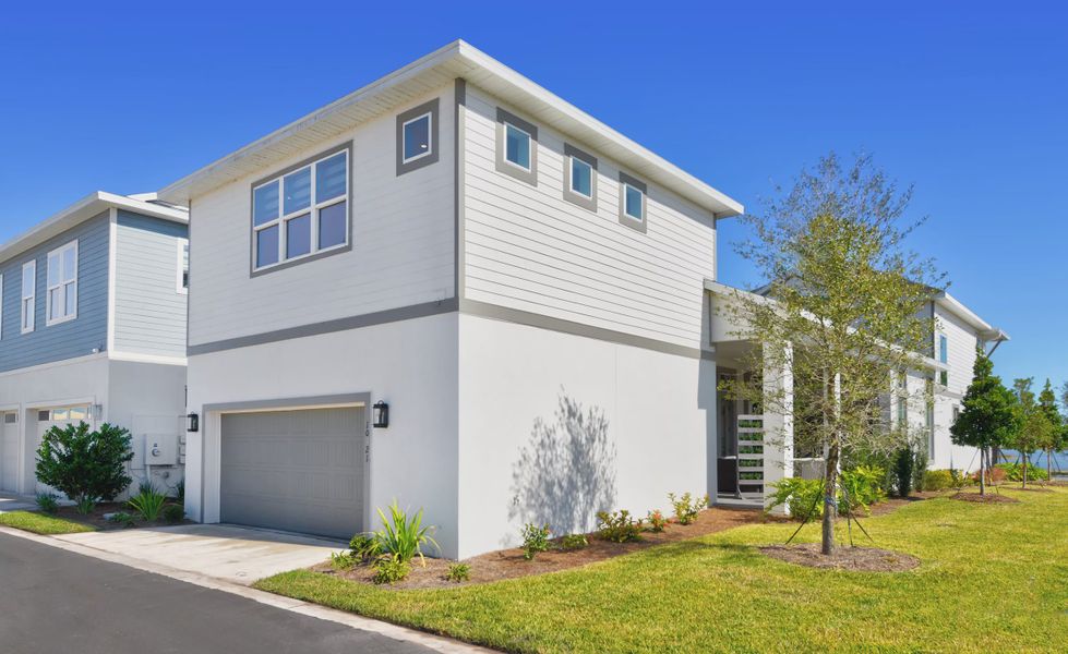 Front exterior of a home in the Laureate Park community, located in Orlando, FL (Image 3).