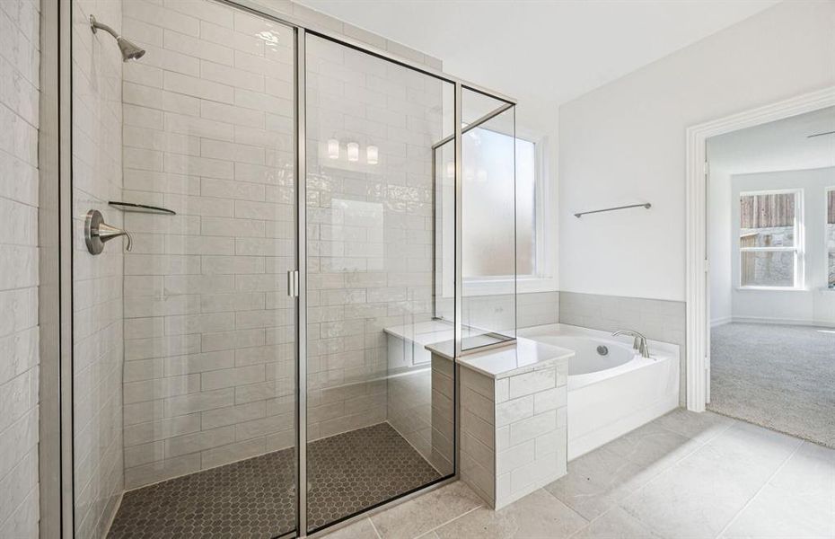 Owner's bath with large shower and tub Owner's bath with large shower and tub