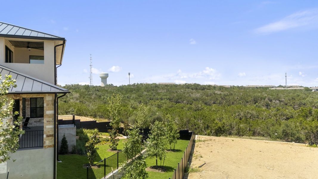 Exterior details and patio area of a home in Milky Way at River Place, Austin (Image 30). Exterior details and patio area of a home in Milky Way at River Place, Austin (Image 30).