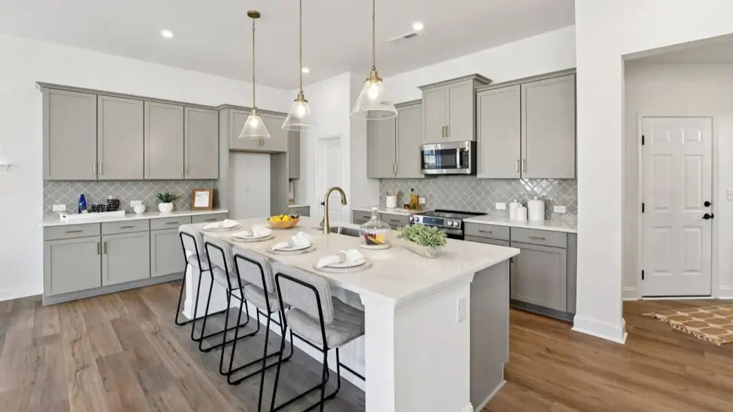 The Brentwood Plan by DRB Homes in The River District, Charlotte NC. - Kitchen