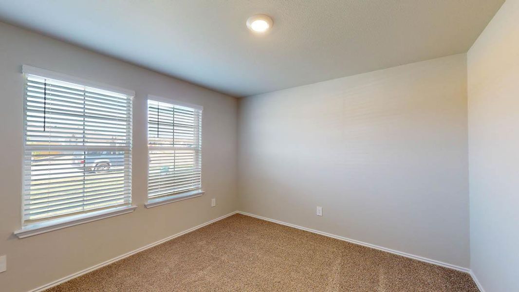 Unfurnished room with carpet flooring and baseboards