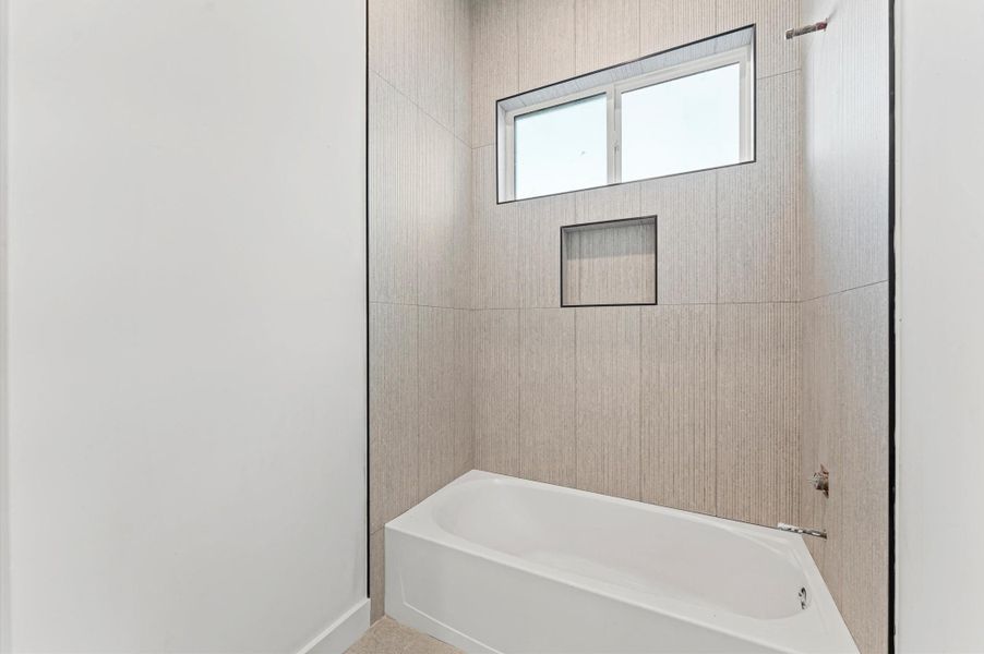 Upstairs bathroom for secondary bedroom.