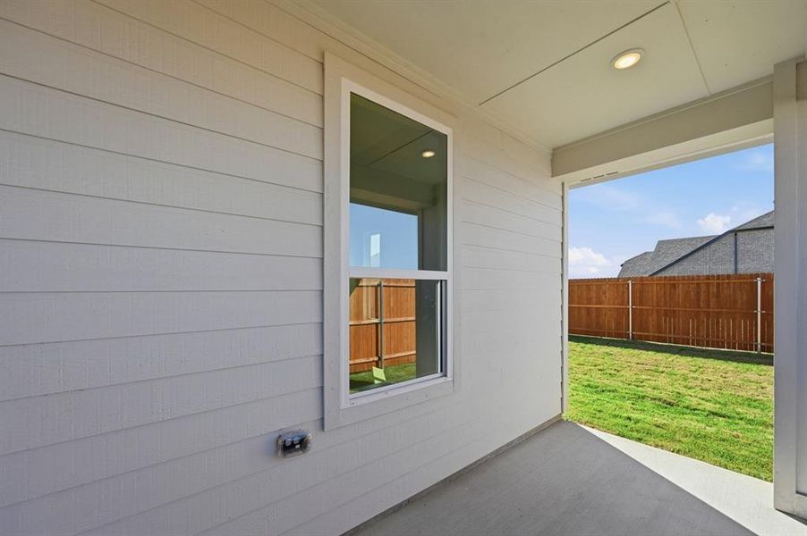Exterior details and patio area of a home in Heartland, Crandall (Image 2).