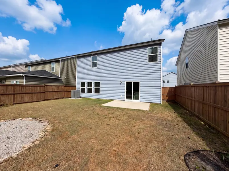 Exterior details and patio area of a home in , Summerville (Image 3).