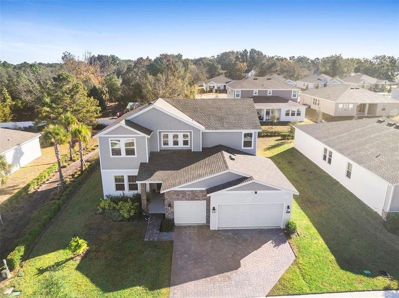Front exterior of a new home in Rhett's Ridge: Legacy Collection, Apopka, FL, highlighting curb appeal (Image 25).
