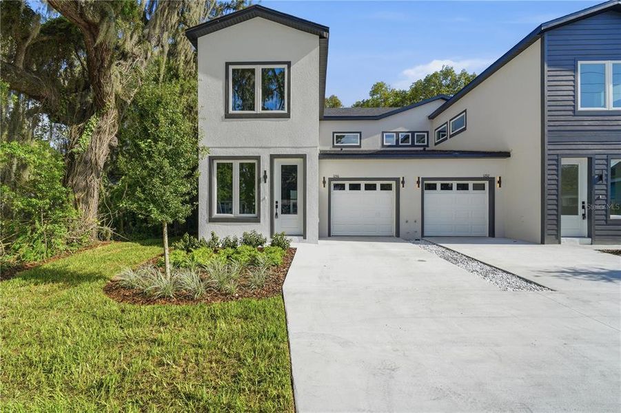 Front exterior of a new home in , Orlando, FL, highlighting curb appeal (Image 2). Front exterior of a new home in , Orlando, FL, highlighting curb appeal (Image 2).