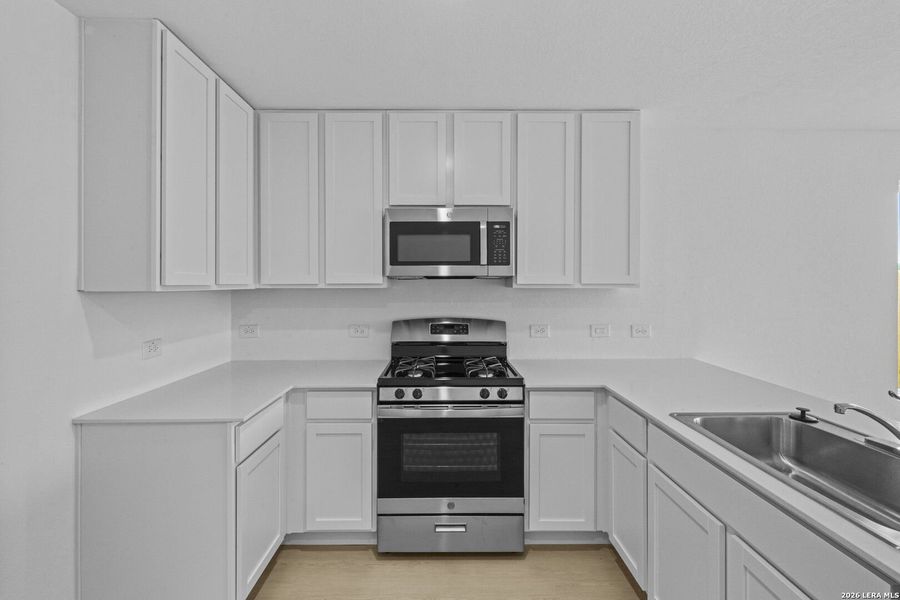 Furnished interior view inside a new home in Spring Grove, St. Hedwig (Image 6).