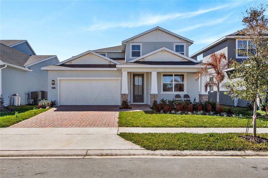 Front exterior of a new home in , Sanford, FL, highlighting curb appeal (Image 25).