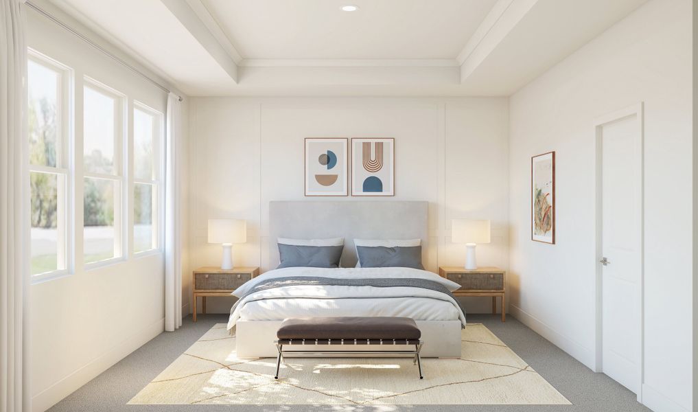 Primary suite with decorative feature wall and crown moulding