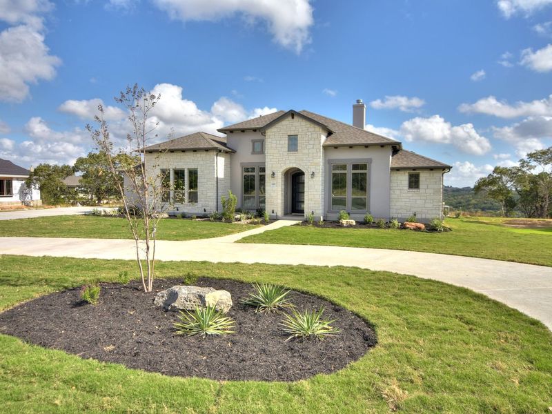 Representative exterior photo of a completed home built from the Avalon by Giddens Homes in Scofield Farms Estates, Georgetown, TX (Image 27).