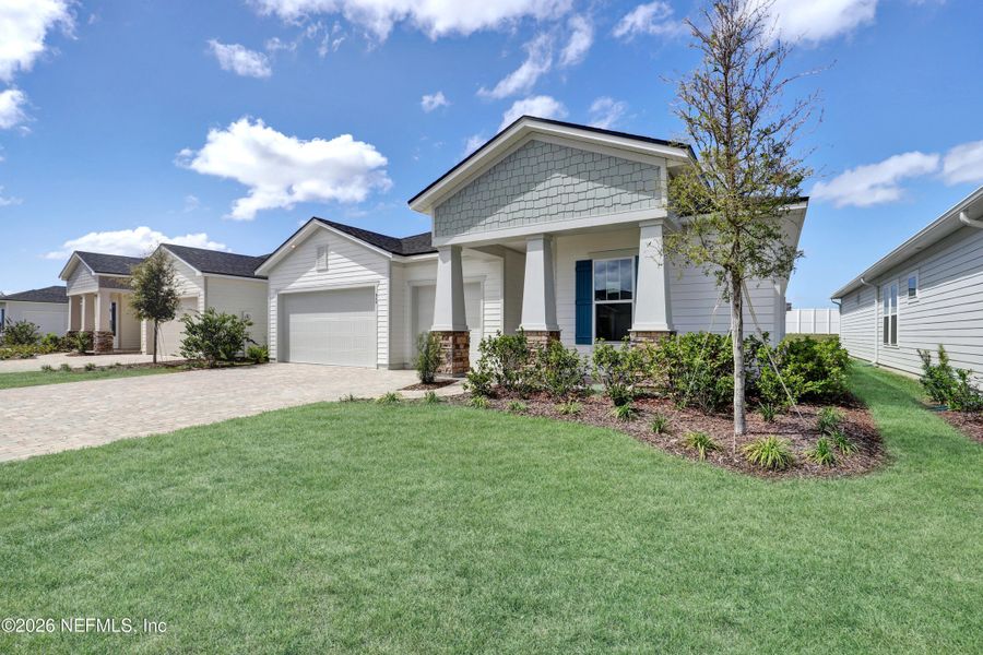 Front exterior of a new home in , St. Augustine, FL, highlighting curb appeal (Image 16).