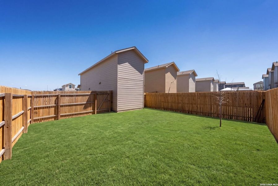 Exterior details and patio area of a home in Flora Meadows, Converse (Image 3). Exterior details and patio area of a home in Flora Meadows, Converse (Image 3).