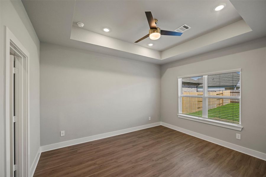 Tranquil downstairs primary suite designed for rest and rejuvenation.