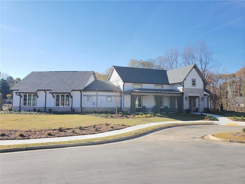Front exterior of a new home in Twin Lakes, Hoschton, GA, highlighting curb appeal (Image 18).