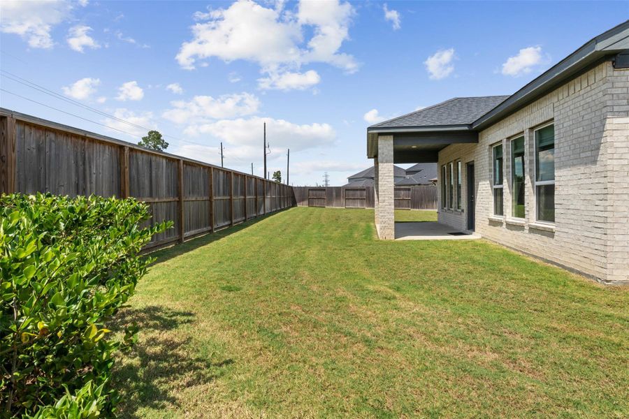 Front exterior of a new home in Raburn Reserve 50s, Tomball, TX, highlighting curb appeal (Image 23). Front exterior of a new home in Raburn Reserve 50s, Tomball, TX, highlighting curb appeal (Image 23).