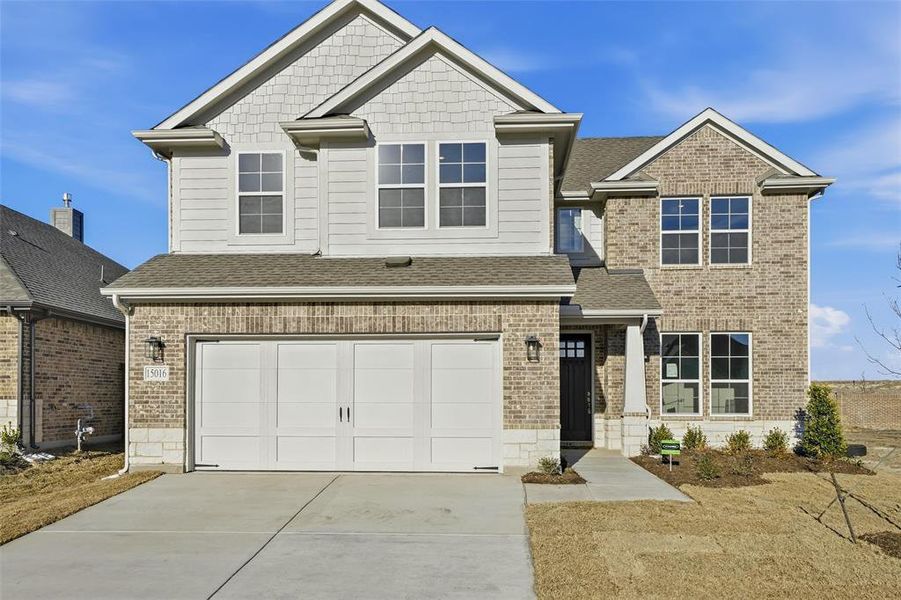 Front exterior of a new home in Morningstar, Aledo, TX, highlighting curb appeal (Image 26). Front exterior of a new home in Morningstar, Aledo, TX, highlighting curb appeal (Image 26).