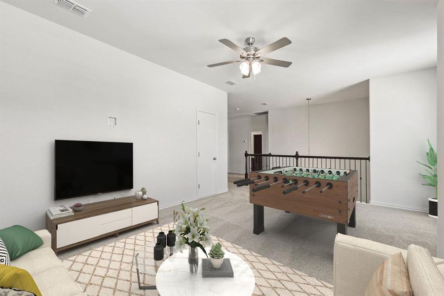 Playroom with light colored carpet and ceiling fan