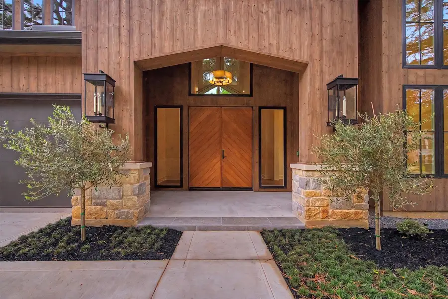 Exterior details and patio area of a home in , The Woodlands (Image 29).