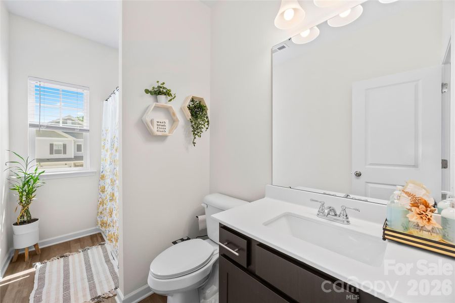 Furnished interior view inside a new home in Orchard Creek, Charlotte (Image 16).