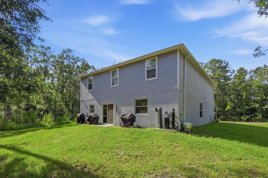 Exterior details and patio area of a home in Flagler Estates, Hastings (Image 33).
