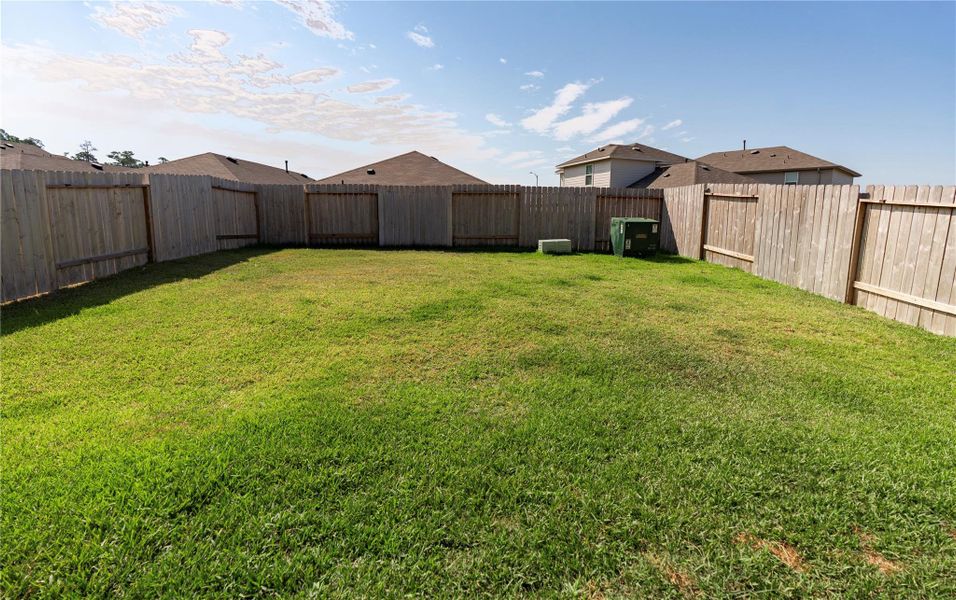 Exterior details and patio area of a home in , Spring (Image 14). Exterior details and patio area of a home in , Spring (Image 14).