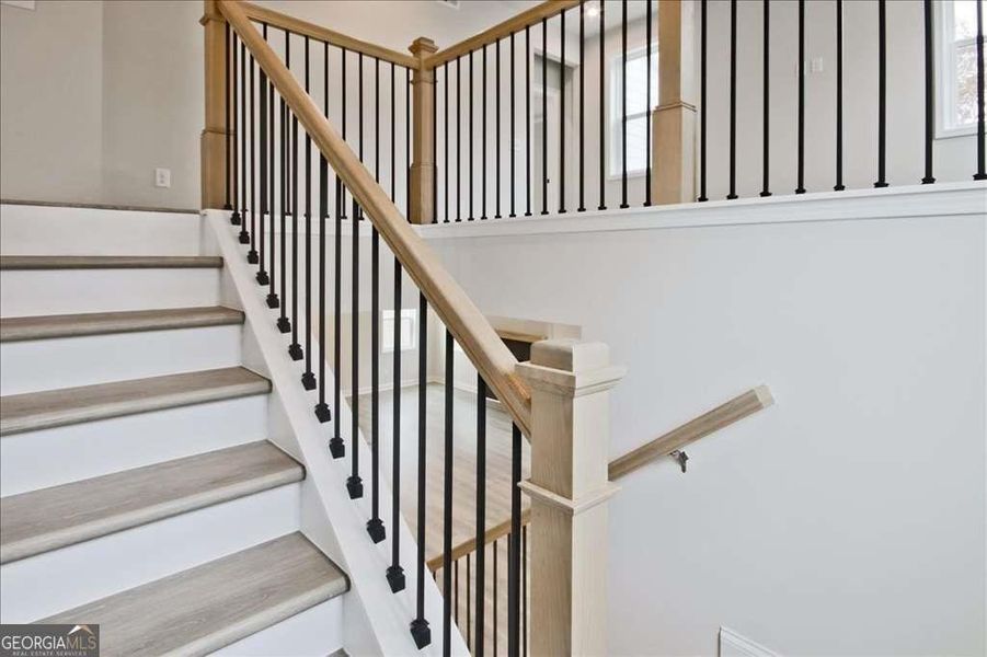 Spacious, unfurnished interior of a new home in The Paddocks at Doc Hughes, Buford (Image 40).