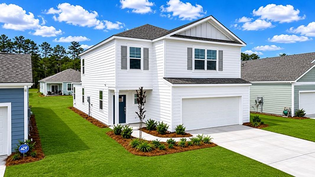 Front exterior of a new home in Hillcrest, Ravenel, SC, highlighting curb appeal (Image 2).