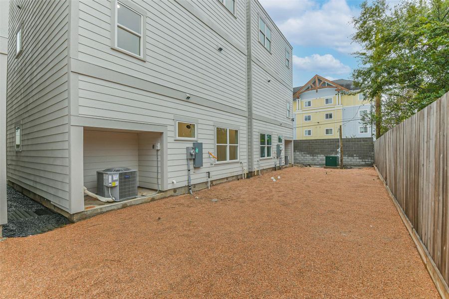 Exterior details and patio area of a home in , Houston (Image 4).