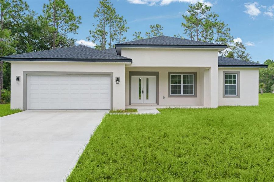 Front exterior of a new home in , Citrus Springs, FL, highlighting curb appeal (Image 23).