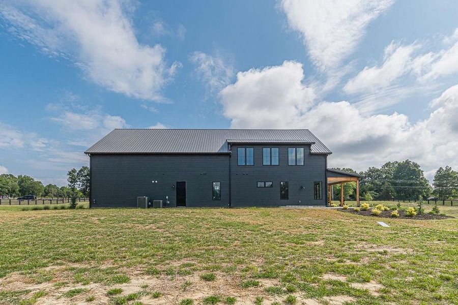 Front exterior of a new home in , Bremen, GA, highlighting curb appeal (Image 23). Front exterior of a new home in , Bremen, GA, highlighting curb appeal (Image 23).