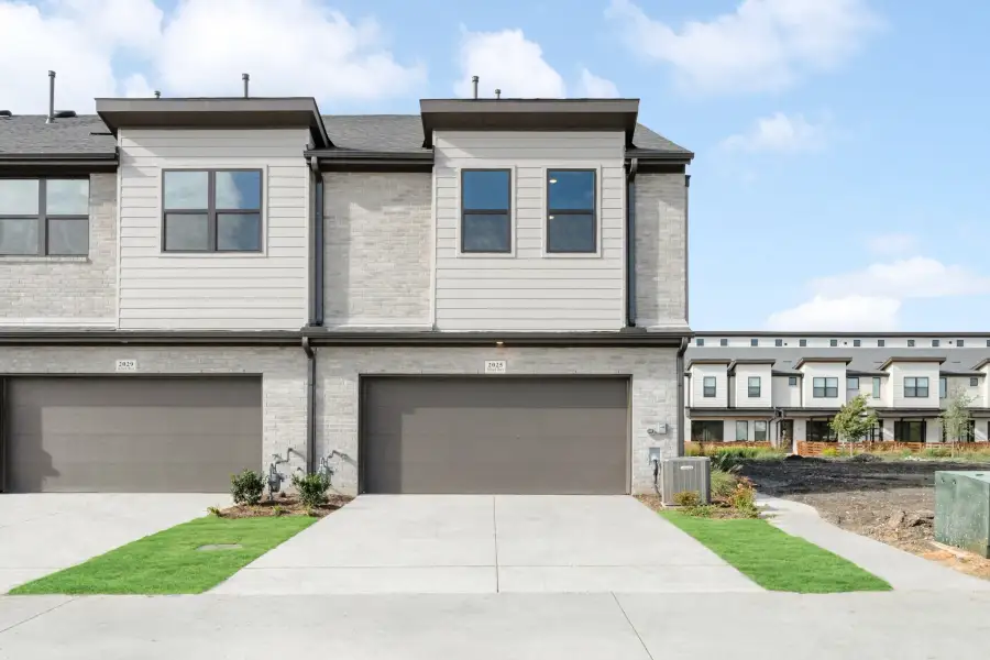 Front exterior of a new home in Ten Mile Creek, Celina, TX, highlighting curb appeal (Image 27).