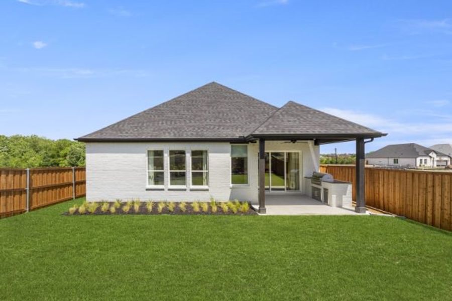 Exterior details and patio area of a home in The Highlands, Rockwall (Image 4).