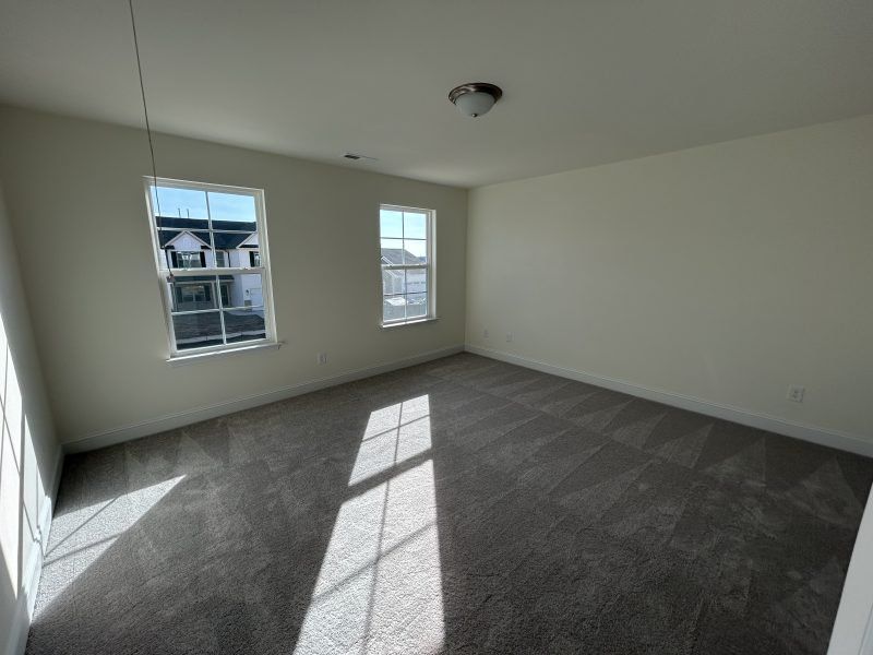 Spacious, unfurnished interior of a new home in Miller's Reserve, Winston-Salem (Image 49).