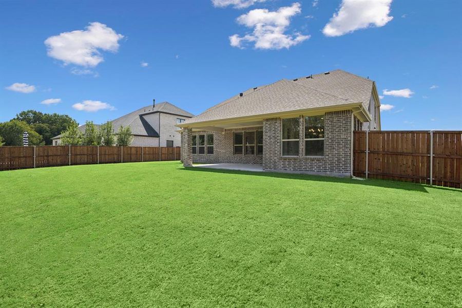 Exterior details and patio area of a home in Lincoln Pointe, Van Alstyne (Image 3). Exterior details and patio area of a home in Lincoln Pointe, Van Alstyne (Image 3).
