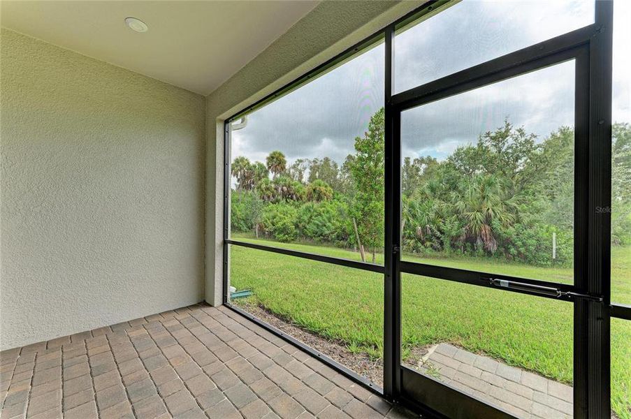 Exterior details and patio area of a home in Wellen Park, Venice (Image 3).