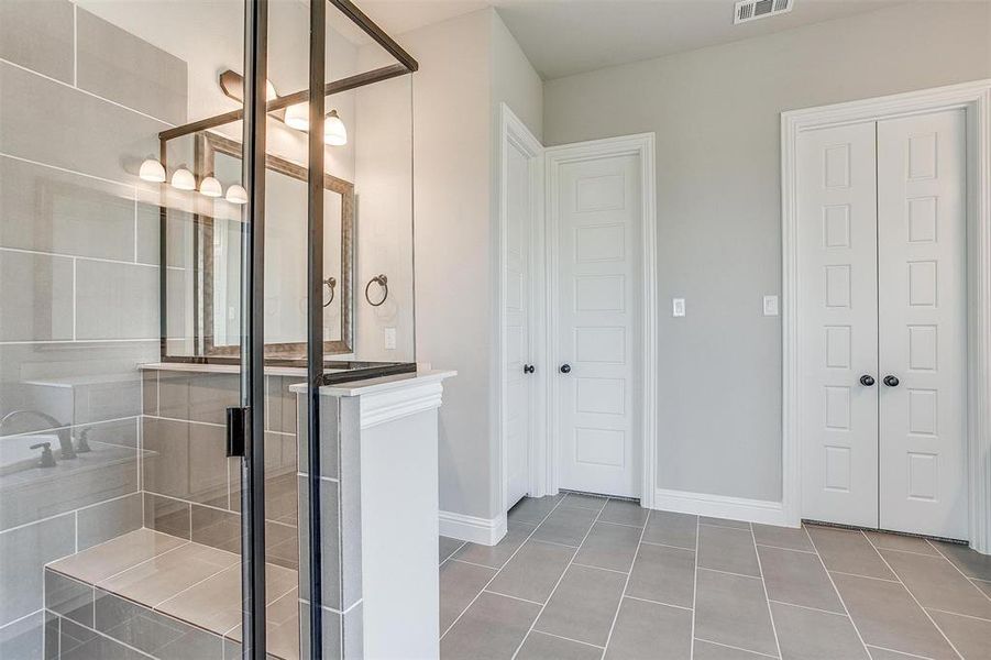 Bathroom featuring tile patterned floors