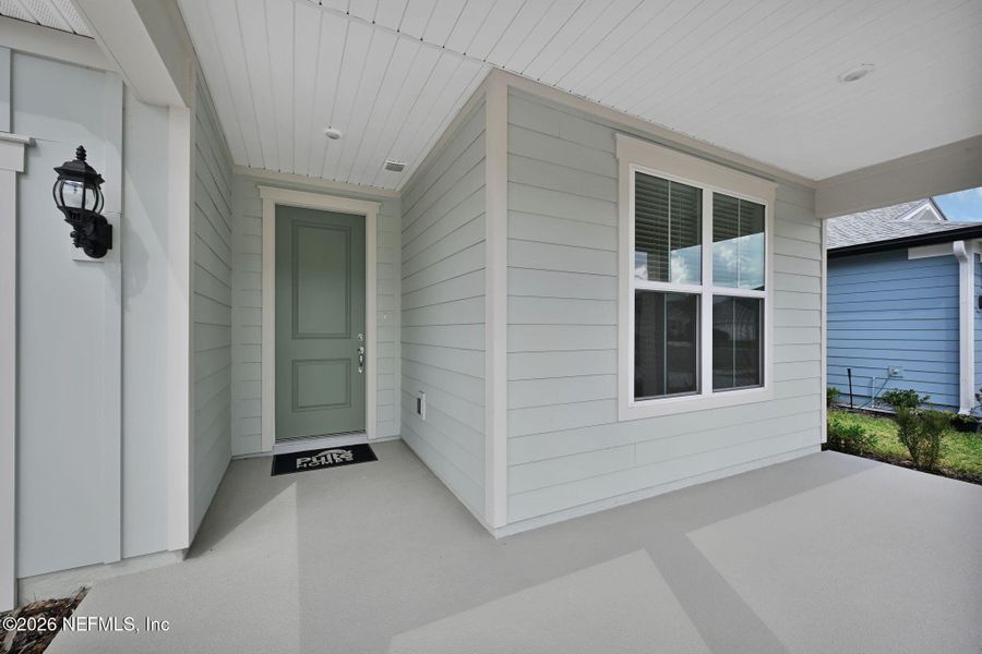 Exterior details and patio area of a home in Hyland Trail, Green Cove Springs (Image 3).