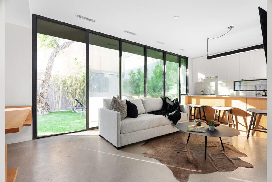 Living area with concrete floors Living area with concrete floors