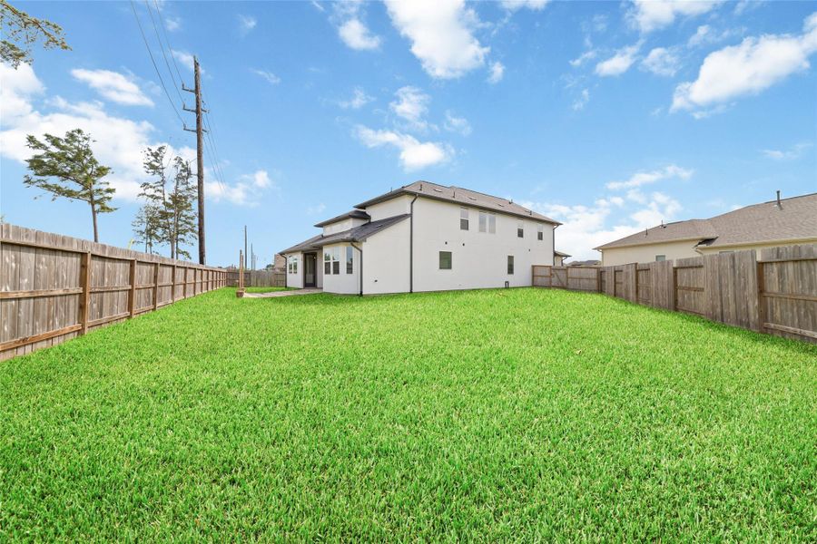 Exterior details and patio area of a home in , Tomball (Image 3). Exterior details and patio area of a home in , Tomball (Image 3).
