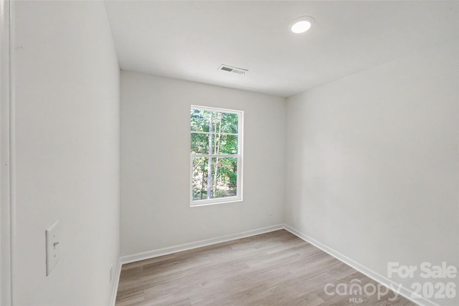 Spacious, unfurnished interior of a new home in , Iron Station (Image 22).
