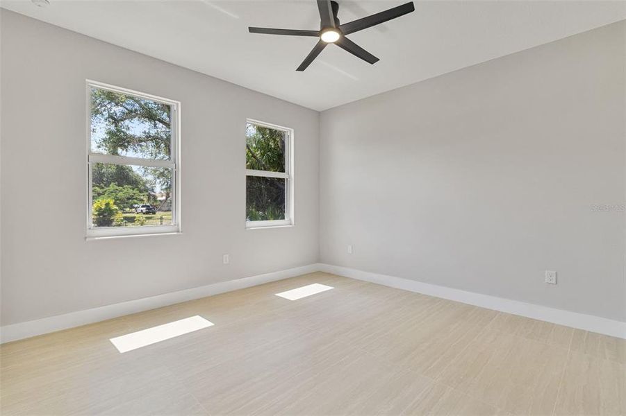 Spacious, unfurnished interior of a new home in , Port Charlotte (Image 24).