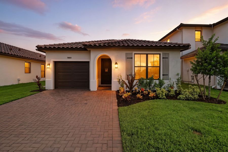 Front exterior of a home in the Maple Ridge community, located in Ave Maria, FL (Image 11). Front exterior of a home in the Maple Ridge community, located in Ave Maria, FL (Image 11).