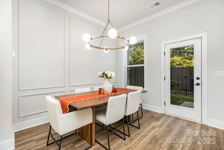 Large Dining area features custom picture molding.