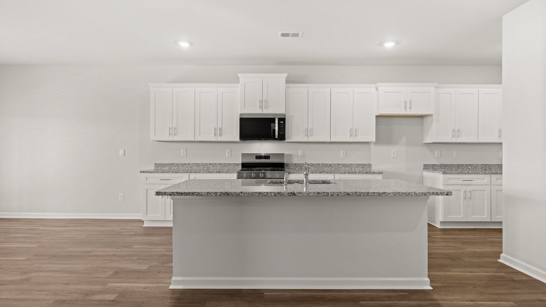 Representative furnished interior of a home built from the Halton by D.R. Horton in Southwind Village, Evans (Image 6).