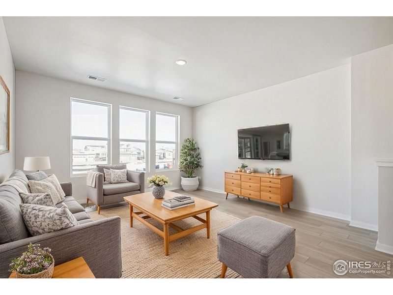 Furnished interior view inside a new home in Kinston Mainstreet Townhomes, Loveland (Image 4).