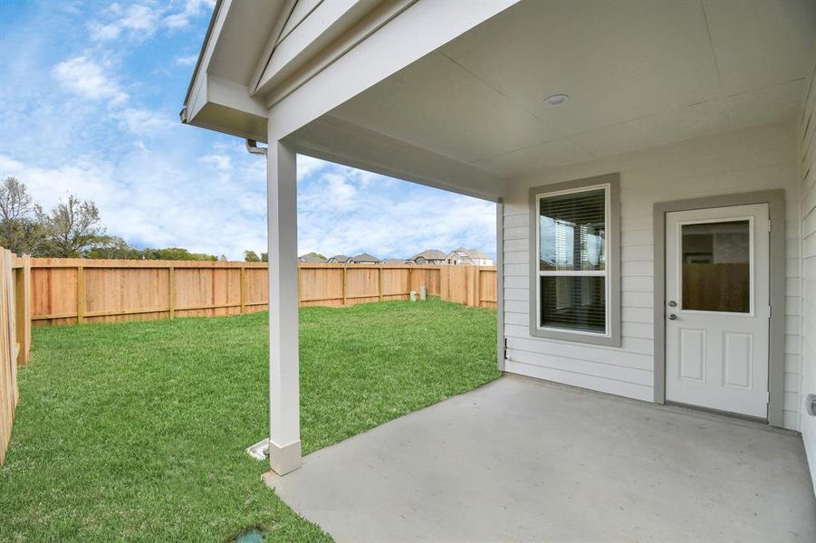 Come and see this spacious backyard with its beautiful covered patio. There is plenty of room for the kids to play and adults to relax. Perfect for your outdoor living space, patio furniture, bbq pit, and so much more. The possibilities are endless!