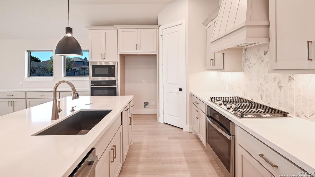 Furnished interior view inside a new home in Cibolo Valley Heights 65', Cibolo (Image 8).