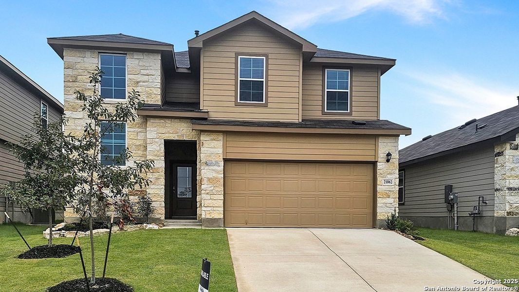 Front exterior of a new home in Brookstone Creek, San Antonio, TX, highlighting curb appeal (Image 2). Front exterior of a new home in Brookstone Creek, San Antonio, TX, highlighting curb appeal (Image 2).