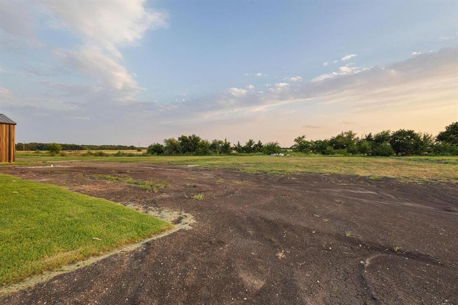 View of yard with a view of countryside